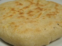 Pita still puffy from the oven