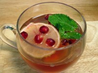 A cup of pomegranate champagne punch