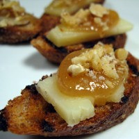 Manchego Cheese, Quince, and Walnut Crostini